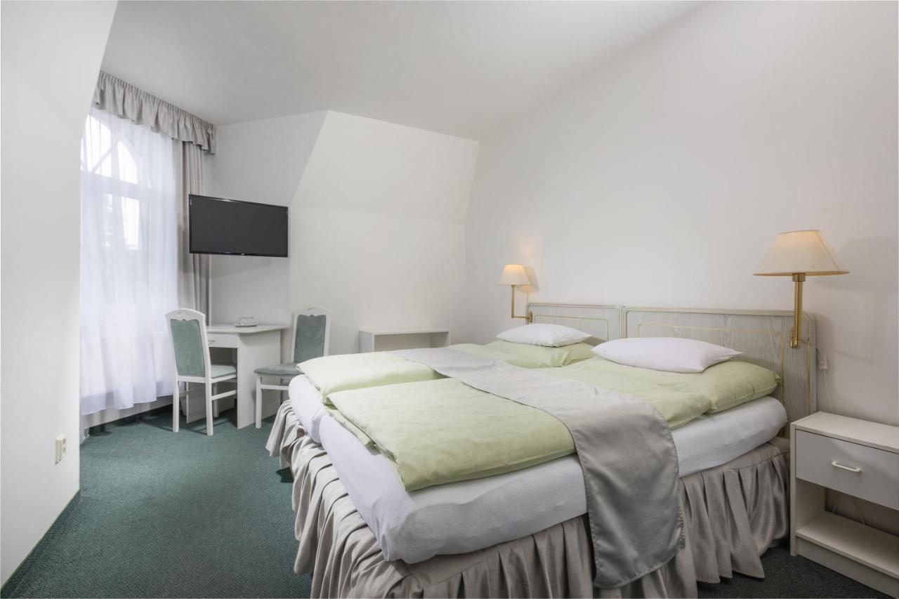 Doppel- oder Zweibettzimmer